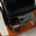 Engine mounting and frame base — detail cropped from the source photograph, not another camera angle.
