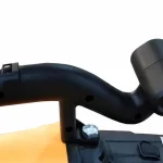 Handle and housing in the source side view — detail cropped from the source photograph, not another camera angle.