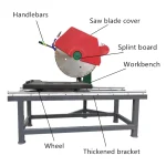 Sliding table and guarded saw head