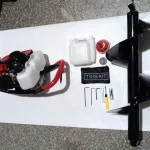 Loose auger bit and powerhead; supply list to confirm