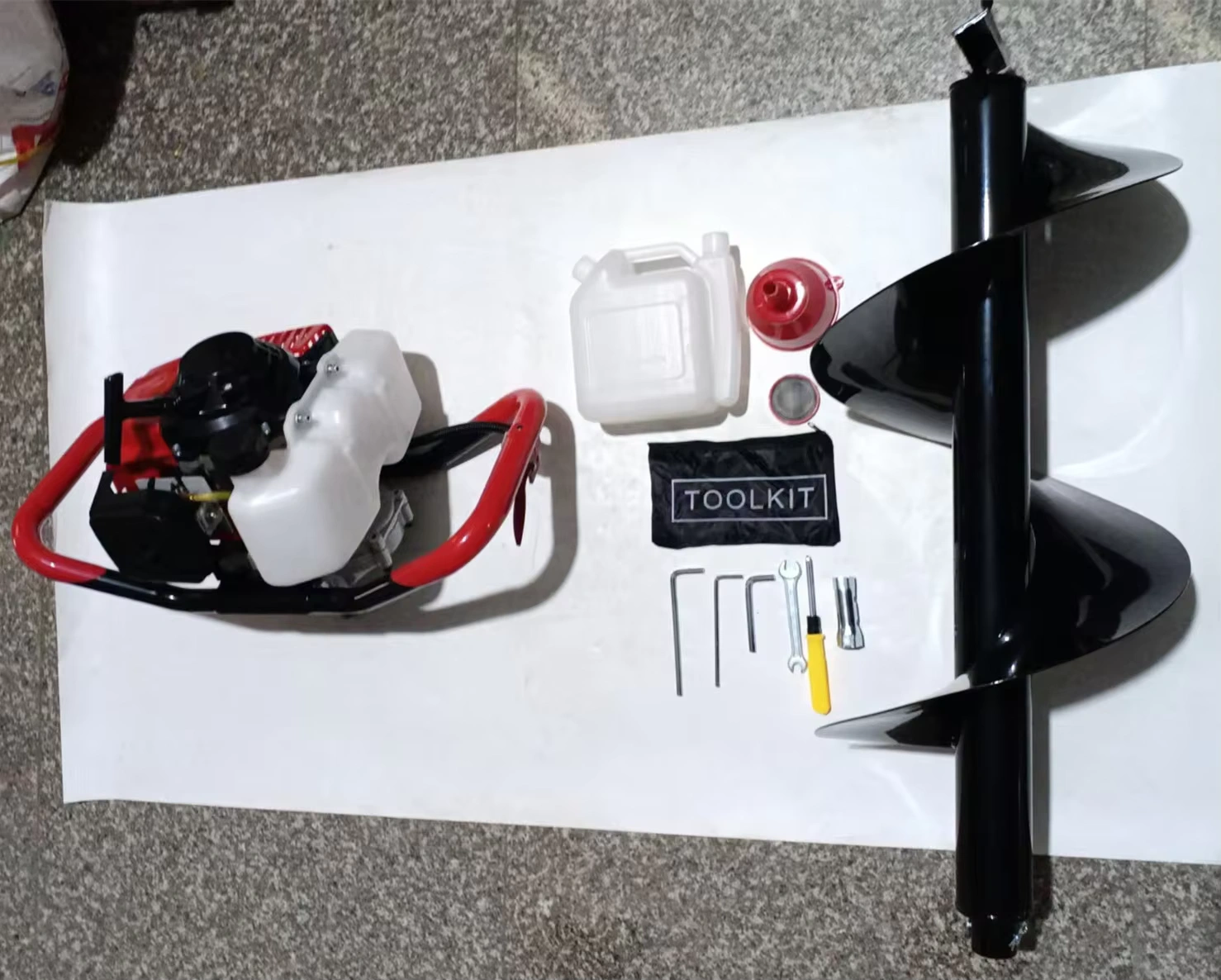 Loose auger bit and powerhead; supply list to confirm