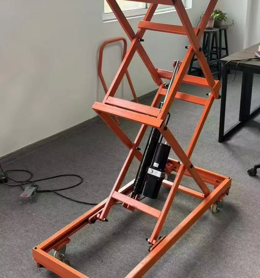 Raised hydraulic scissor table with manual mechanism