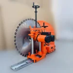 Wall-saw head and handwheel layout