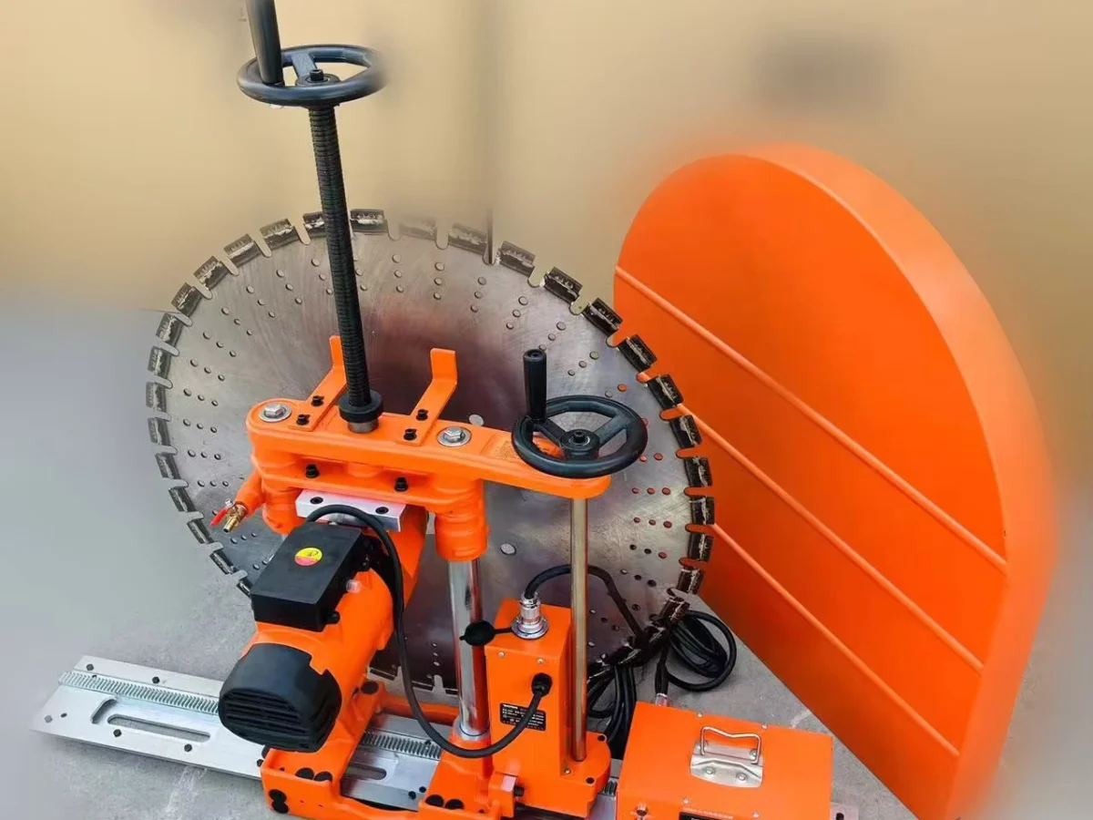 Rail-mounted wall-saw head and blade guard