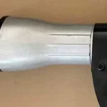 Tool holder, front barrel and side-handle connection from the source photograph.